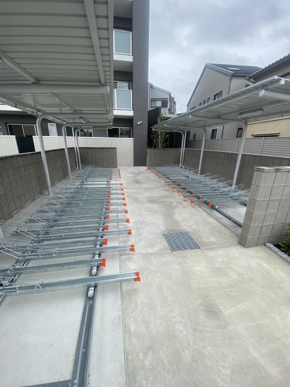 GRANCOURT千里丘1階1LDK 自転車置き場の画像