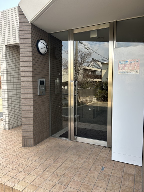 アクシス1階1K エントランスの画像